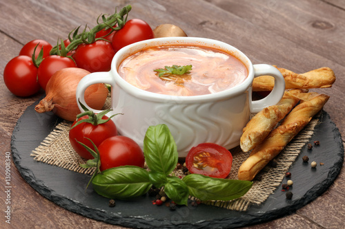 fresh tomato soup in a white bowl 