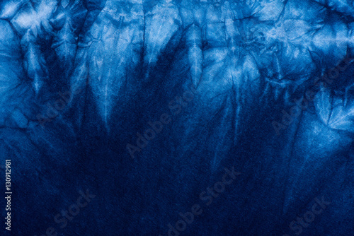 Pattern of Indigo batik dye on cotton cloth, Dye indigo fabric background photo