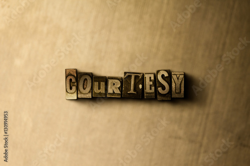 COURTESY - close-up of grungy vintage typeset word on metal backdrop. Royalty free stock - 3D rendered stock image.  Can be used for online banner ads and direct mail.
