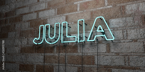 JULIA - Glowing Neon Sign on stonework wall - 3D rendered royalty free stock illustration.  Can be used for online banner ads and direct mailers.. photo