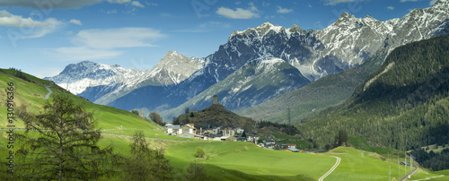 view to alpine valley in spring day
