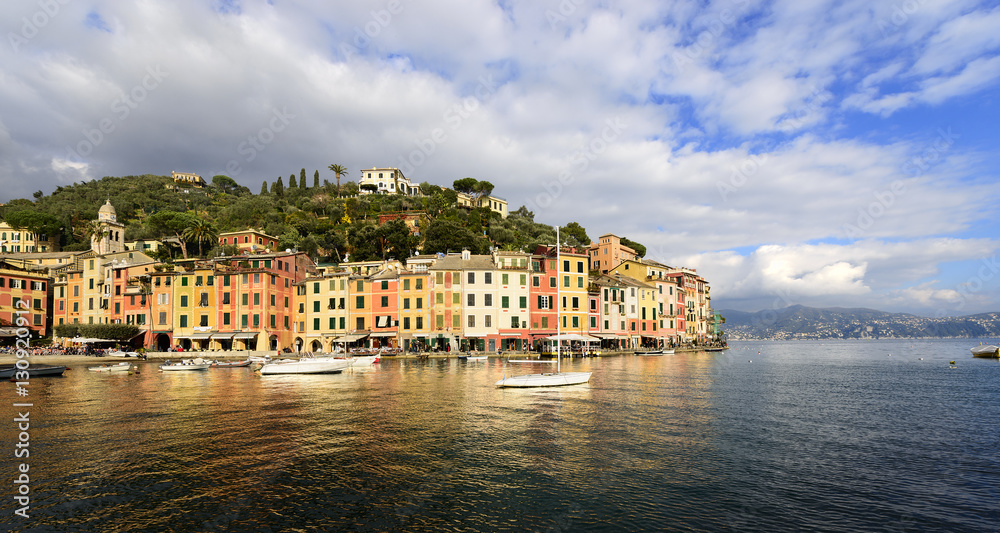 The harbor of Portofino with boats and the colorful houses. Genova, Liguria, Italy