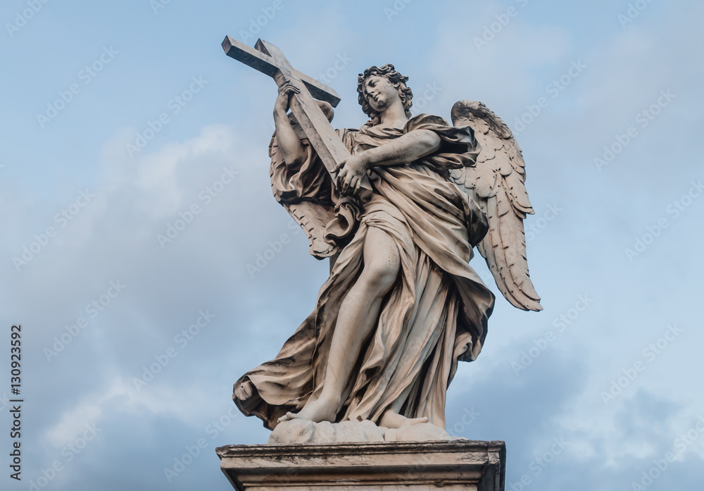Fototapeta premium Sculpture of an angel on the bridge of Sant'Angelo in Rome, Ital