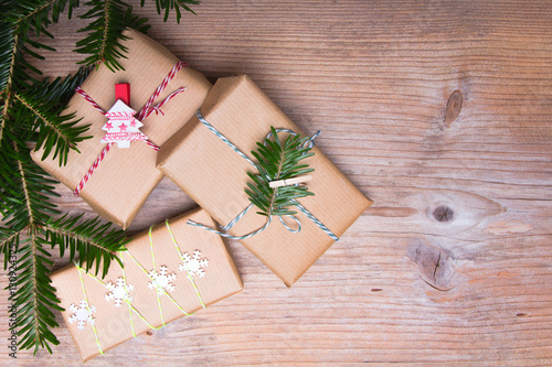 Christmas presents on wooden background, retro style with copy space