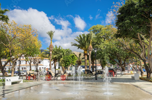 Fountain and horse carriages in town square of Mijas. Malaga pro © Valery Bareta