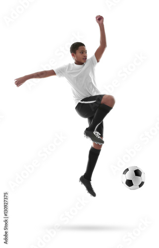 Fototapeta Naklejka Na Ścianę i Meble -   African-American youth football player on white background