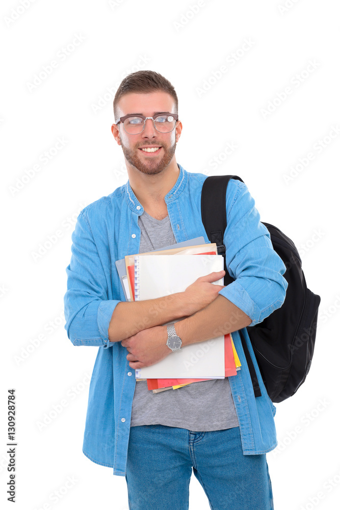 Male student with a school bag holding books isolated on white ...