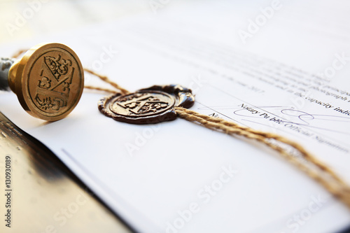Old notarial wax stamp on document, closeup