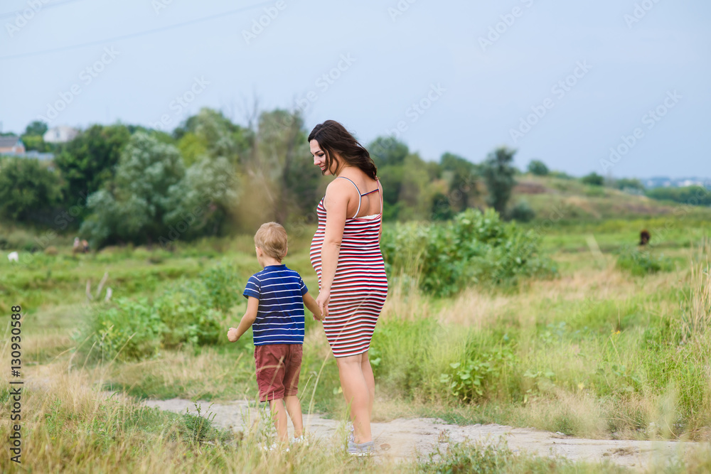 Pregnant woman with her son Pregnant woman with her son