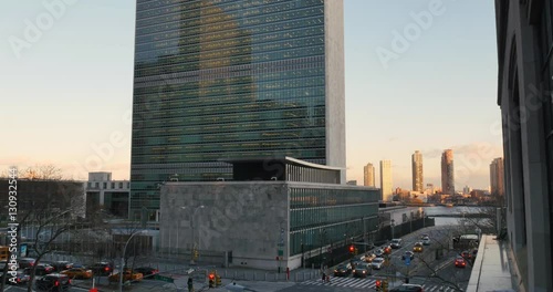 NEW YORK - Circa December, 2016 - A dusk establishing shot of the United Nations Building in Midtown Manhattan.  	