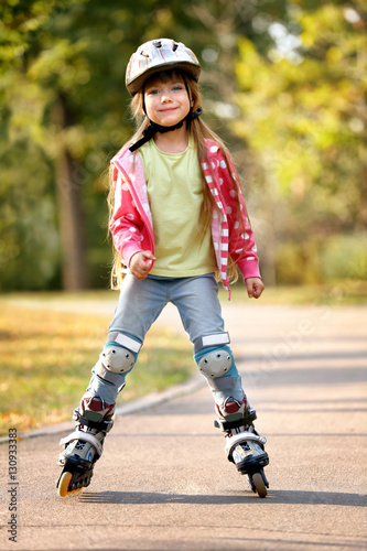 Cute little girl on roller ...