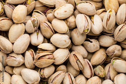 Roasted and salted pistachios in shell.