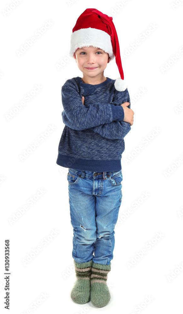 Cute little boy in Santa hat on white background Cute little boy in Santa hat on white background