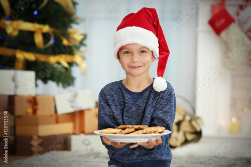 Cute little boy in Santa ha...