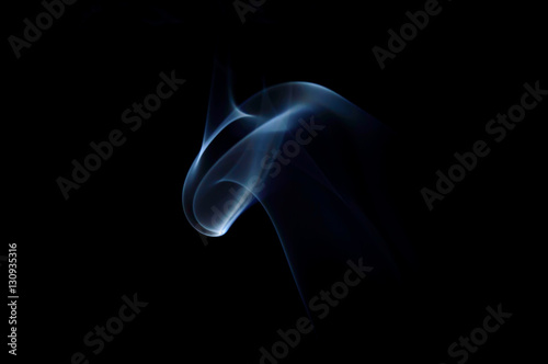 Centered blue abstract swirly smoke art plume