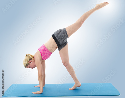 Woman exercising with yoga