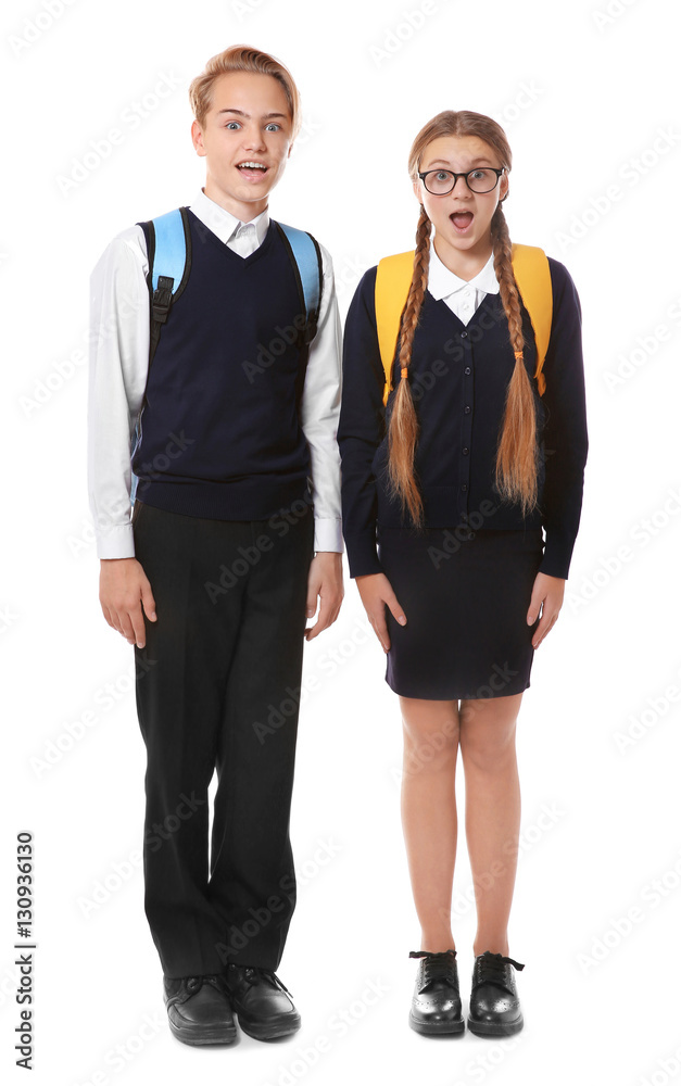 Teenagers with backpacks standing on white background Teenagers with backpacks standing on white background