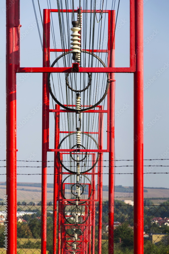 Communication wires lead to switching station from radio transmitter tower Communication wires lead to switching station from radio transmitter tower