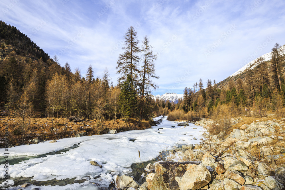 Frozen river in the Val Roseg in Switzerland Frozen river in the Val Roseg in Switzerland