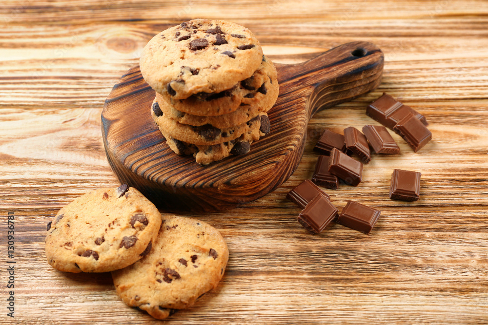 Homemade chocolate cookies on cutting desk, wooden background Homemade chocolate cookies on cutting desk, wooden background