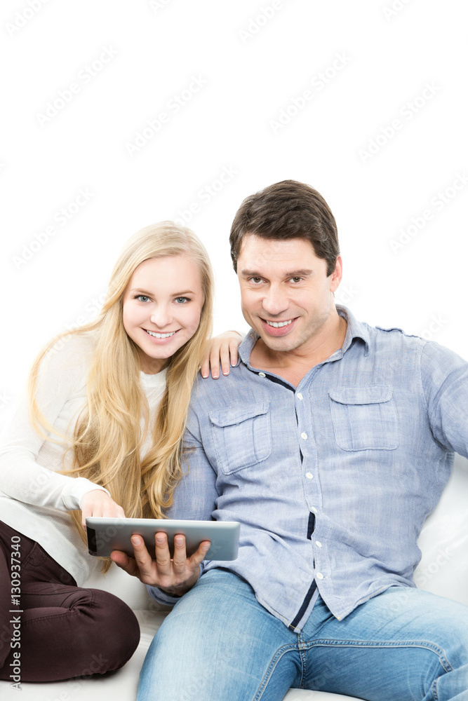 Happy couple surfing and shopping online.