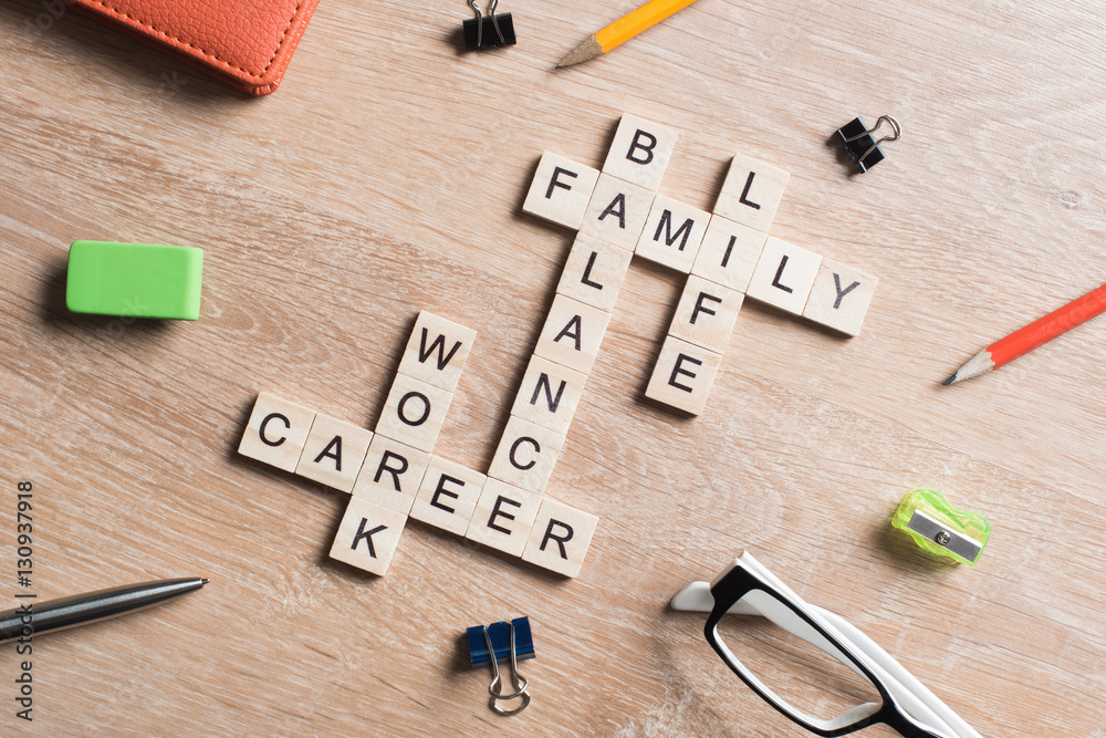 Conceptual keywords on wooden table with elements of game making crossword Conceptual keywords on wooden table with elements of game making crossword