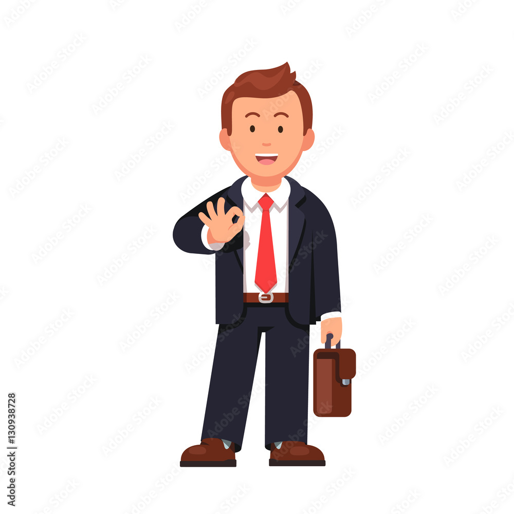 Standing business man showing OK gesture Standing business man showing OK gesture