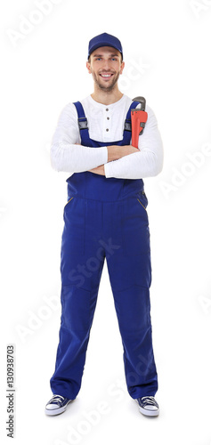 Plumber with crossed hands ...
