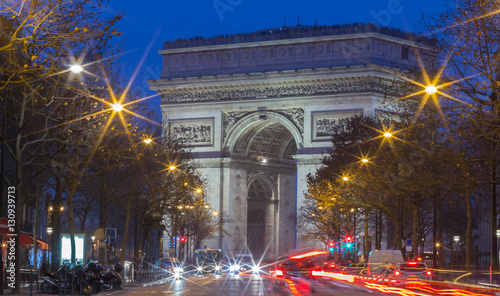the Triumphal Arch at night, Paris, France.