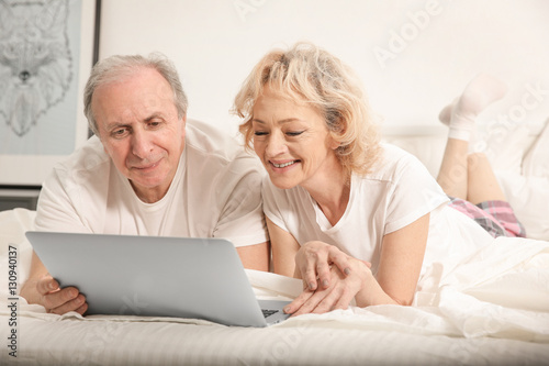Senior couple making video ...