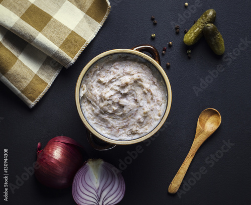 Homemade tasty lard with onion greaves and pickles, top view photo