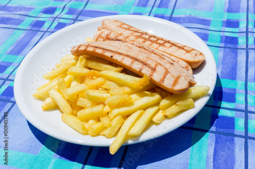 Wurstell with potato chips photo