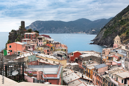 Vernazza town, located in Cinque Terre national park, with beautiful houses and old fortress ruins