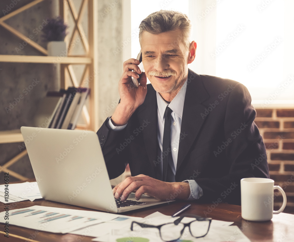 Mature businessman working Mature businessman working