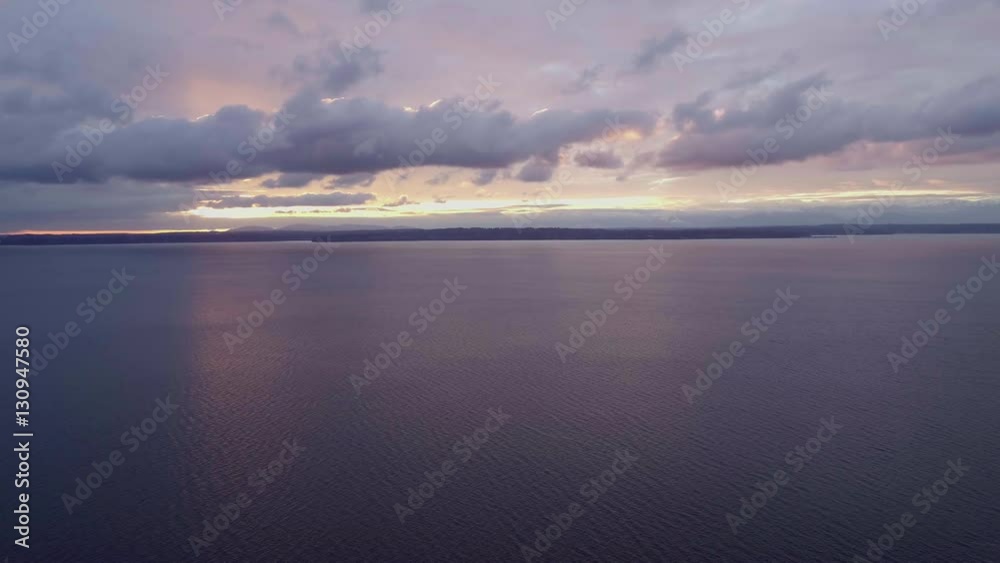 Orange and Purple Sunset Glowing Light Over Puget Sound Bainbridge Island Olympic Mountains Orange and Purple Sunset Glowing Light Over Puget Sound Bainbridge Island Olympic Mountains