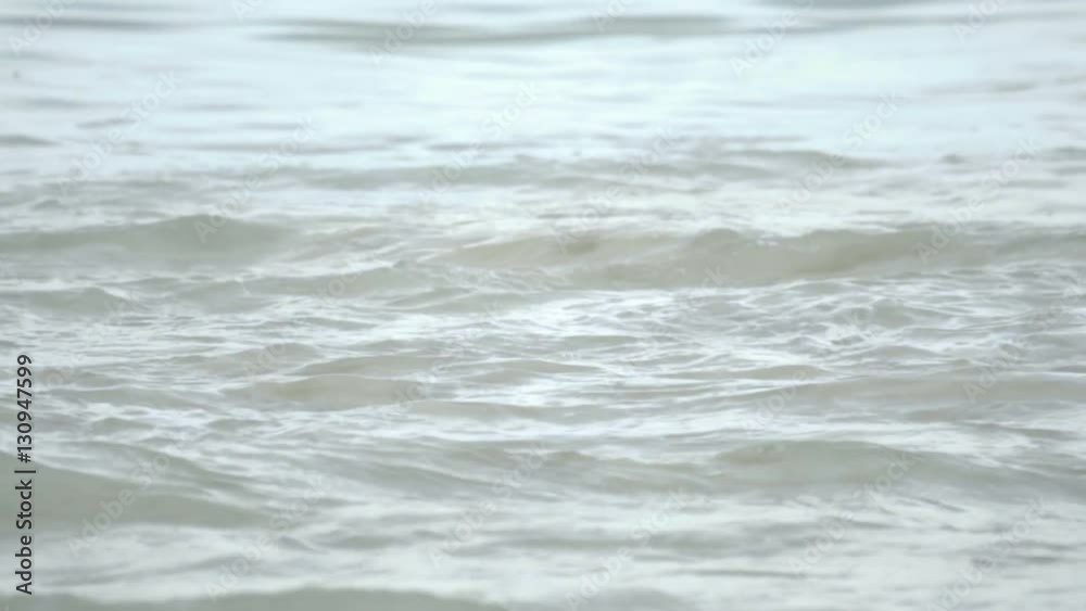 Rolling wave close-up, slow motion Rolling wave close-up, slow motion