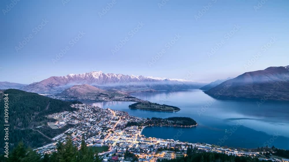 Queenstown downtown aerial view New Zealand at Dusk timelapse. With stunning view from the top of city. Remarkable point