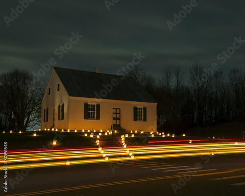 This is a long exposure of Dunker Church at Antietam National Battlefield.  The church is illuminated by candles in memory of Civil War casualties. © adamparent