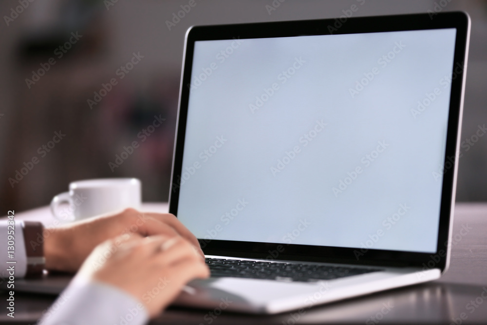 Businessman using laptop, closeup Businessman using laptop, closeup