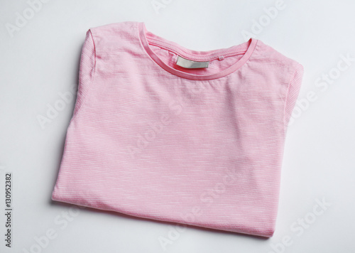 Blank pink t-shirt on white background