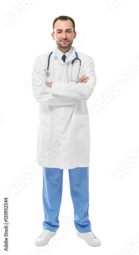 Handsome male doctor on whi...