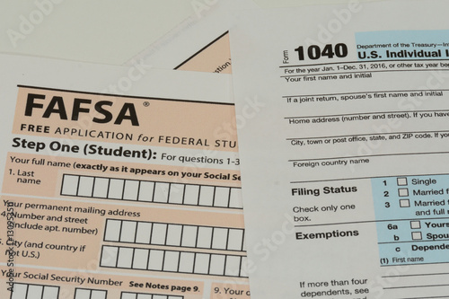 US IRS Form 1040 and FAFSA application photo