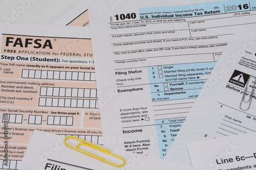 US IRS Form 1040 and FAFSA application photo