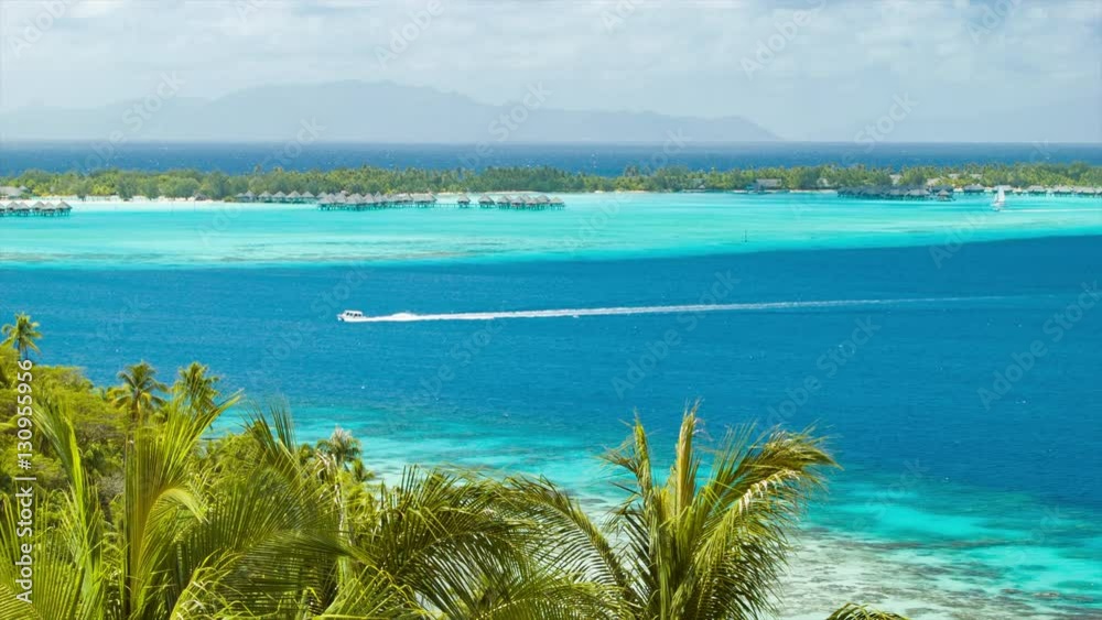 Bora Bora Tropical Wide Lagoon Scene with Over Water Bungalows on Exotic Luxury Resorts Shades of Blue Water and Green Foliage Bora Bora Tropical Wide Lagoon Scene with Over Water Bungalows on Exotic Luxury Resorts Shades of Blue Water and Green Foliage