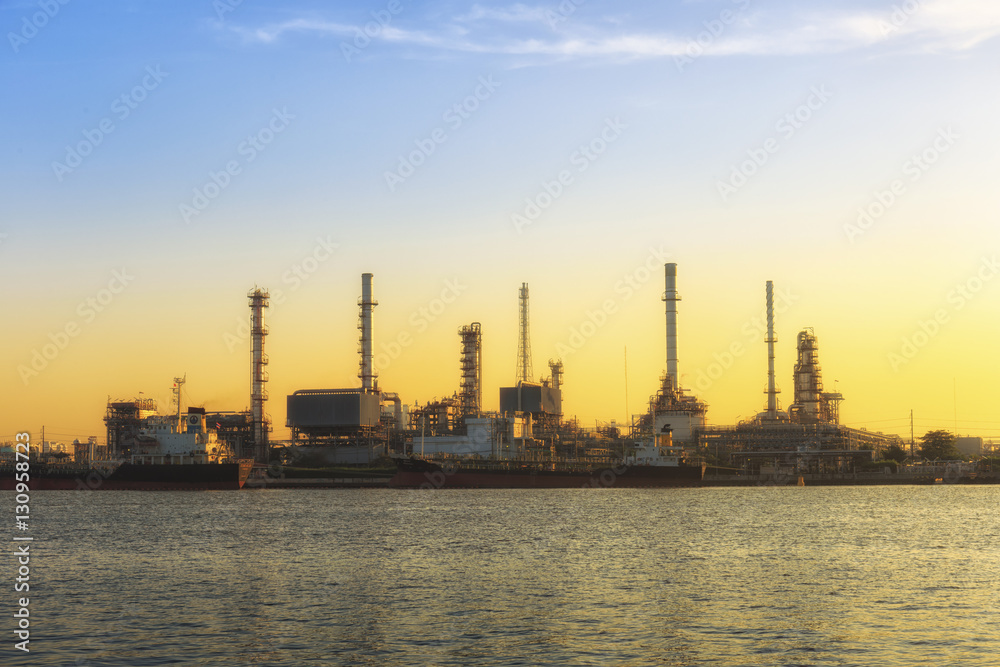 Bangchak Petroleum's oil refinery Petrochemical industrial with sunrise background in Phra Khanong District, Bangkok, Thailand