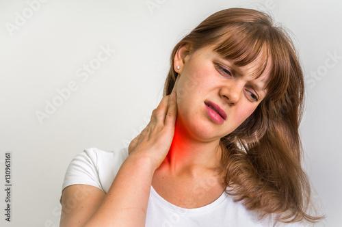 Woman with muscle injury having pain in her neck