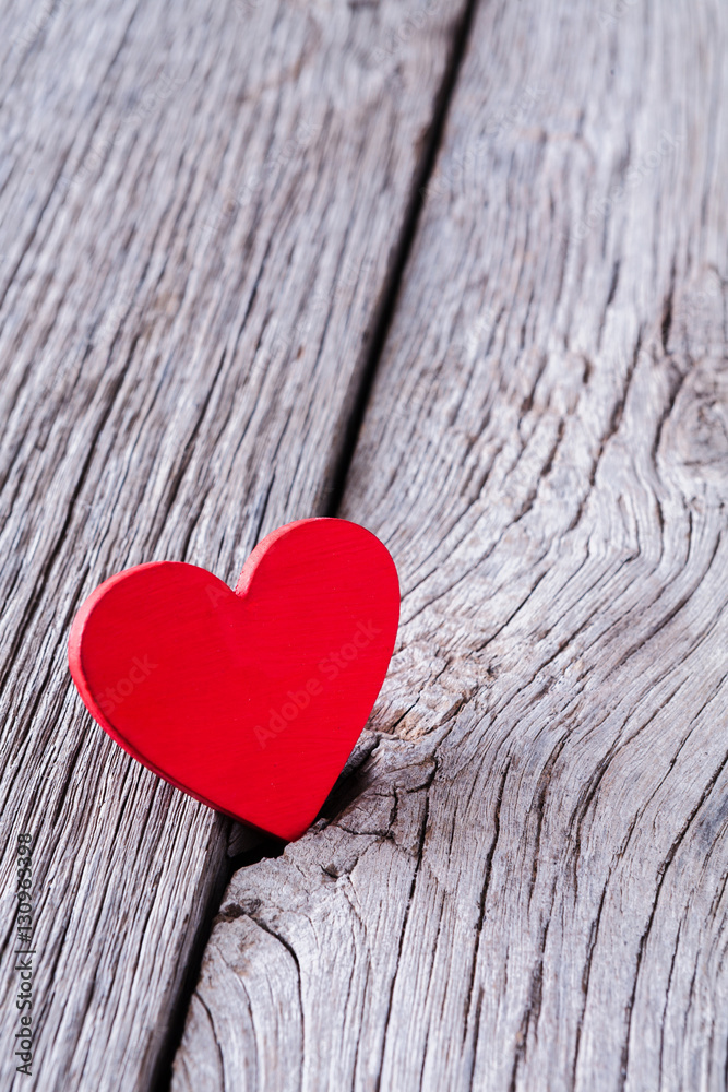 Valentine day background, wooden heart on wood with copy space Valentine day background, wooden heart on wood with copy space