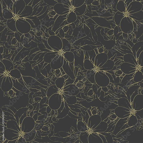 Fragrant flowers of apple trees on a dark background