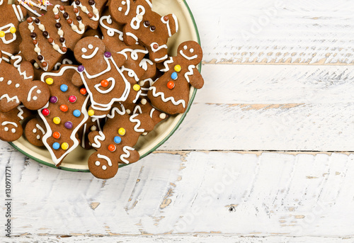 Christmas homemade gingerbread cookies on white wooden table