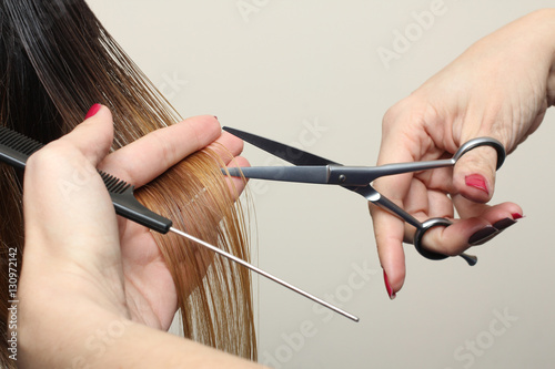 Hairdresser do haircut close up  photo